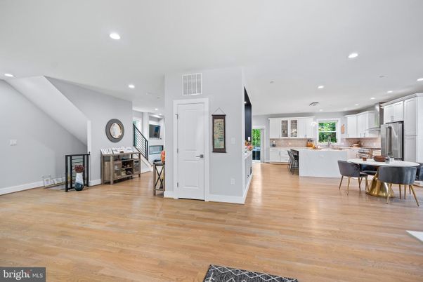 Dining room, Interior, Kitchen, Recessed Lighting, Stainless Steel Appliances, Wood Texture Flooring