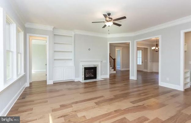 Chandelier, Empty room, Fireplace, Interior, Wood Texture Flooring