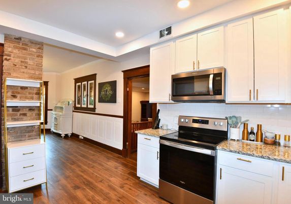 Interior, Kitchen, Recessed Lighting, Stainless Steel Appliances, Stone Walls, Wood Texture Flooring