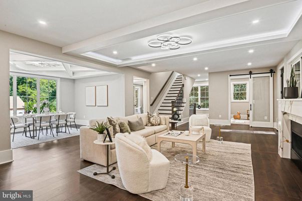 Dining room, Fireplace, Interior, Living room, Recessed Lighting, Wood Texture Flooring