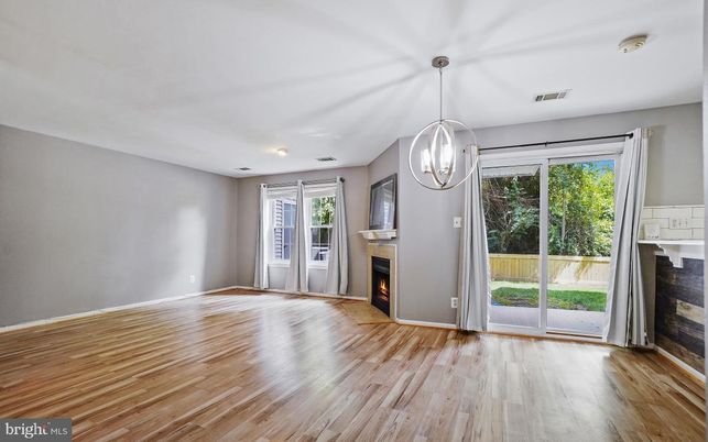 Empty room, Fireplace, Interior, Pendant Lights, Wood Texture Flooring