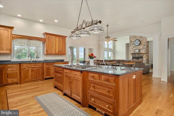 Dining room, Fireplace, Interior, Kitchen, Living room, Pendant Lights, Recessed Lighting, Wood Texture Flooring