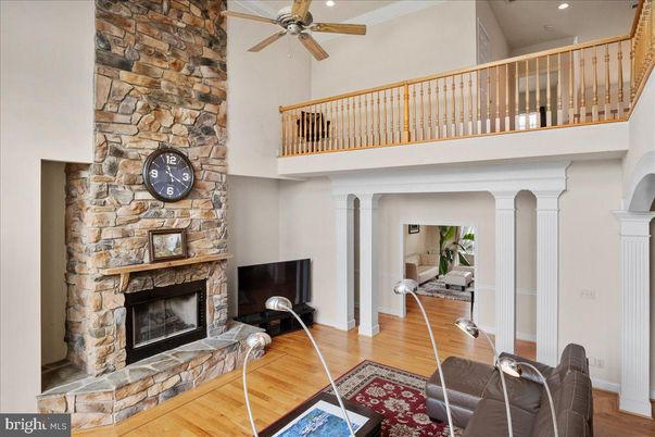 Fireplace, Interior, Recessed Lighting, Stone Walls, Wood Texture Flooring
