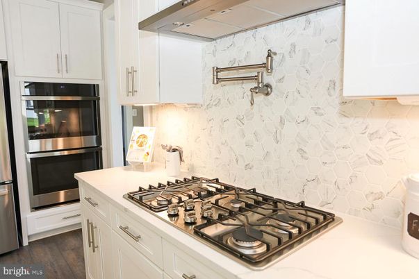 Interior, Kitchen, Marble Walls, Stainless Steel Appliances, Wood Texture Flooring