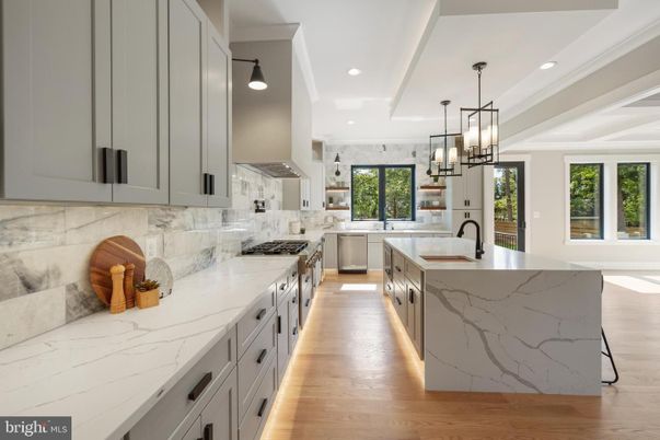 Interior, Kitchen, Marble Walls, Pendant Lights, Recessed Lighting, Stainless Steel Appliances, Wood Texture Flooring