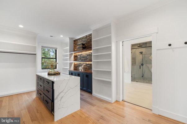 Bathroom, Glass Shower, Interior, Recessed Lighting, Stone Walls, Wood Texture Flooring