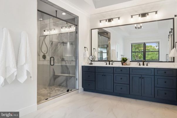 Bathroom, Dual Sink Vanities, Glass Shower, Interior, Marble, Recessed Lighting