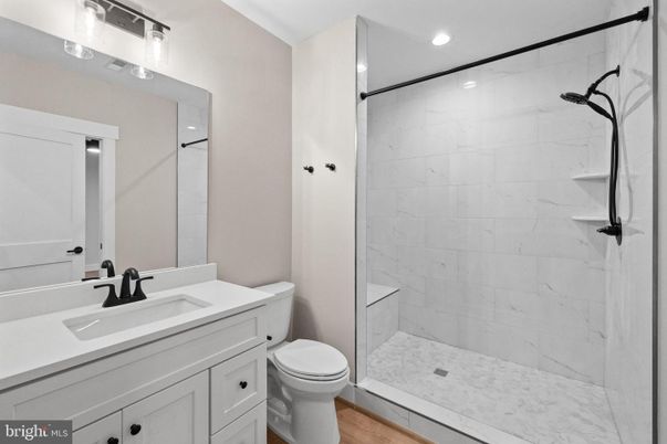 Bathroom, Interior, Marble Walls, Recessed Lighting, Wood Texture Flooring