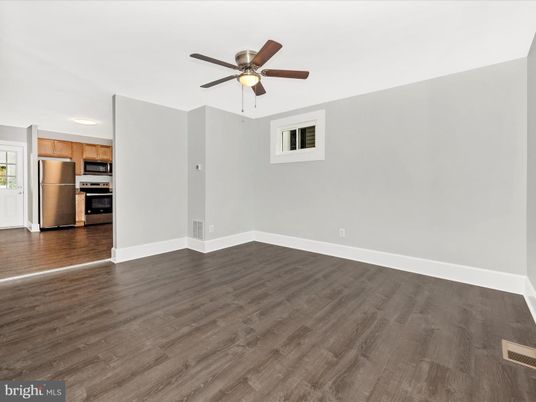 Empty room, Interior, Kitchen, Stainless Steel Appliances, Wood Texture Flooring