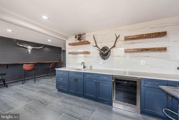 Interior, Kitchen, Marble Walls, Recessed Lighting, Stainless Steel Appliances