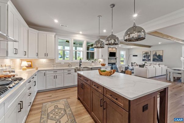 Fireplace, Interior, Kitchen, Living room, Pendant Lights, Recessed Lighting, Stainless Steel Appliances, Wooden Beams, Wood Texture Flooring