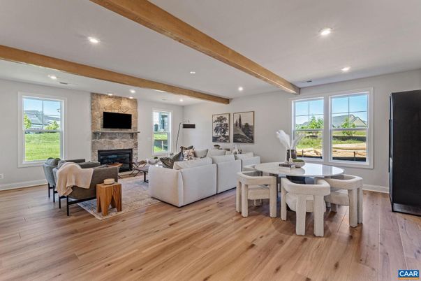 Dining room, Fireplace, Interior, Living room, Recessed Lighting, Stone Walls, Wooden Beams, Wood Texture Flooring