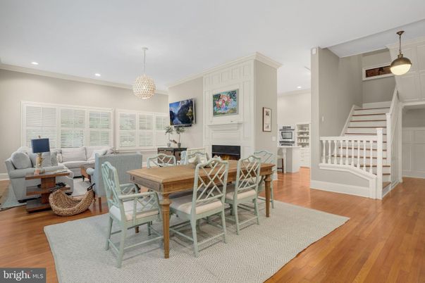 Dining room, Fireplace, Interior, Living room, Pendant Lights, Recessed Lighting, Wood Texture Flooring