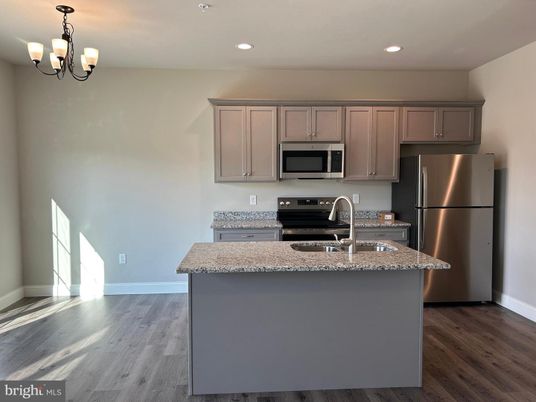 Chandelier, Interior, Kitchen, Recessed Lighting, Stainless Steel Appliances, Wood Texture Flooring
