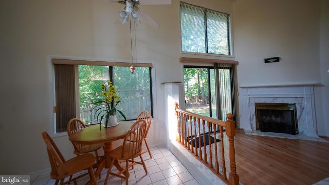 Dining room, Fireplace, Interior, Pendant Lights, Wood Texture Flooring