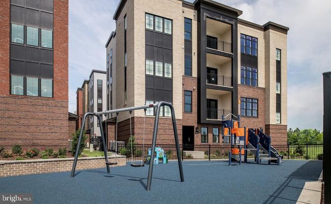 Backyard, Exterior, Facade, Brick Facade, Playground, Condo Building