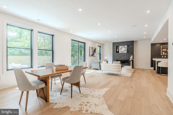 Dining room, Fireplace, Interior, Living room, Recessed Lighting, Wood Texture Flooring