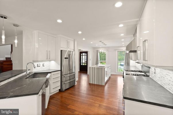Chandelier, Interior, Kitchen, Pendant Lights, Recessed Lighting, Stainless Steel Appliances, Wood Texture Flooring