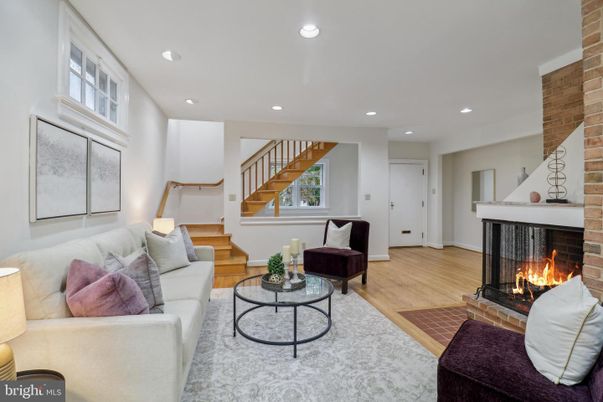 Fireplace, Interior, Living room, Recessed Lighting, Stone Walls, Wood Texture Flooring