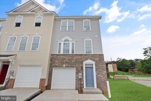 Attached, Exterior, Facade, Brick Facade, Rowhouse