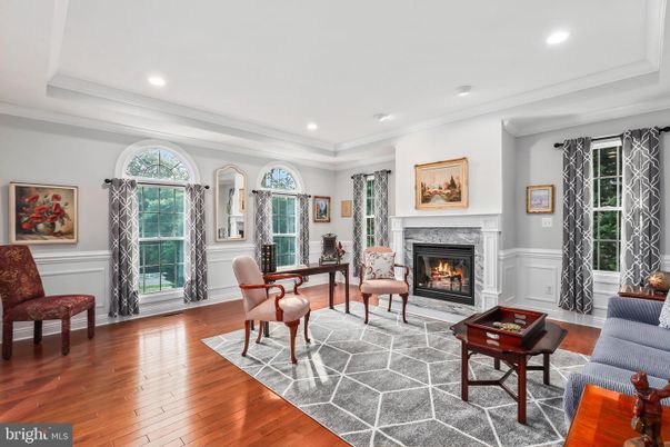 Dining room, Fireplace, Interior, Living room, Recessed Lighting, Wood Texture Flooring