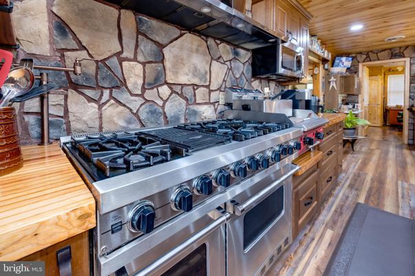 Interior, Kitchen, Recessed Lighting, Stainless Steel Appliances, Stone Walls, Wooden Ceilings, Wood Texture Flooring