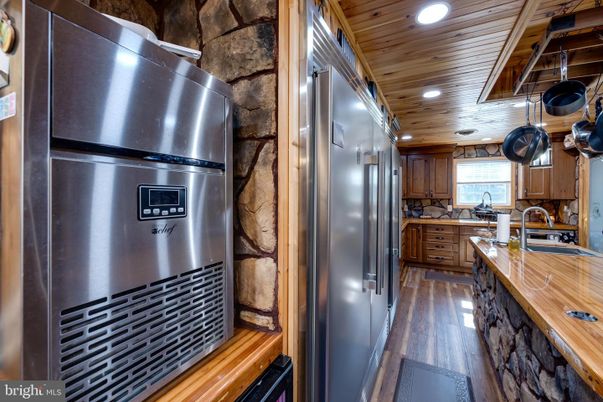 Interior, Kitchen, Recessed Lighting, Stainless Steel Appliances, Stone Walls, Wooden Ceilings, Wood Texture Flooring