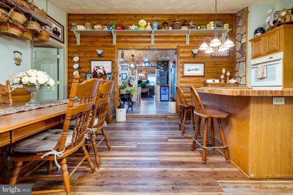 Dining room, Interior, Pendant Lights, Wood Texture Flooring, Wooden Walls