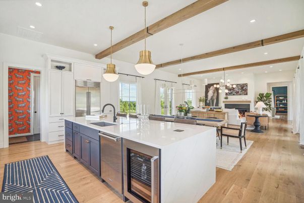 Fireplace, Interior, Kitchen, Living room, Pendant Lights, Recessed Lighting, Stainless Steel Appliances, Wooden Beams, Wood Texture Flooring