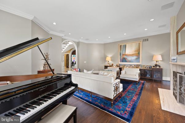 Fireplace, Interior, Living room, Piano, Recessed Lighting, Wood Texture Flooring
