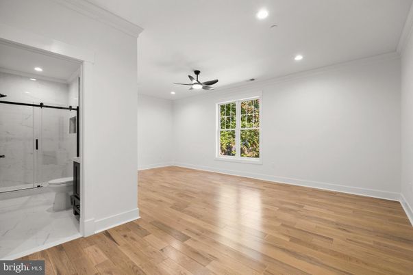 Bathroom, Empty room, Glass Shower, Interior, Marble, Marble Walls, Recessed Lighting, Wood Texture Flooring