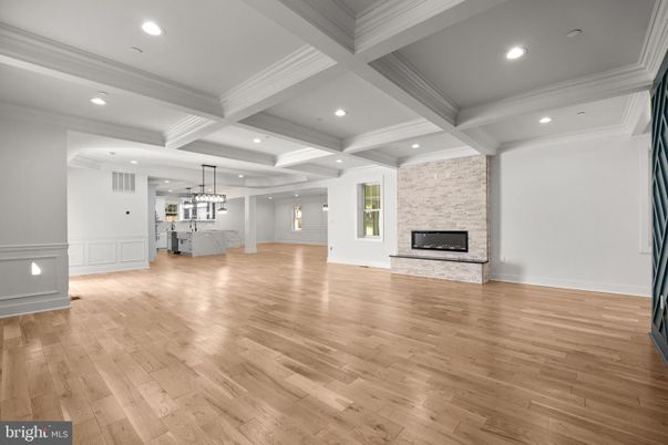 Empty room, Fireplace, Interior, Pendant Lights, Recessed Lighting, Stone Walls, Wood Texture Flooring