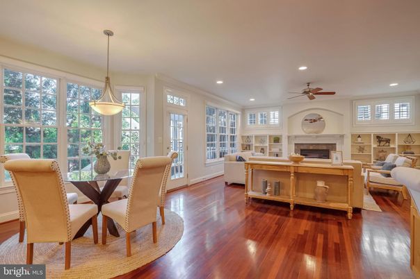 Dining room, Fireplace, Interior, Living room, Pendant Lights, Recessed Lighting, Wood Texture Flooring
