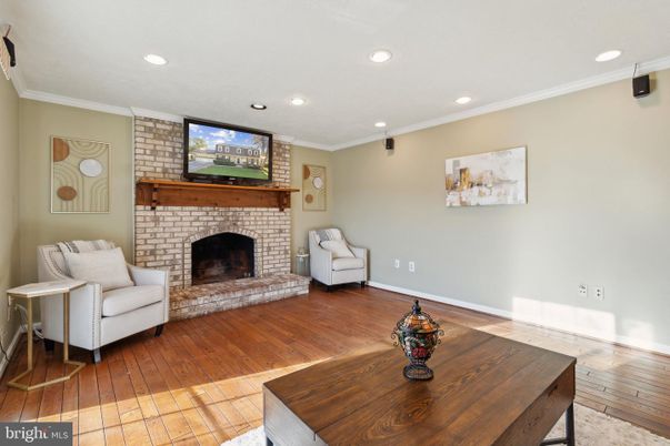 Fireplace, Interior, Recessed Lighting, Stone Walls, Wood Texture Flooring