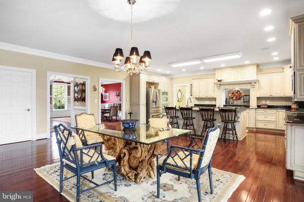 Chandelier, Dining room, Interior, Kitchen, Recessed Lighting, Stainless Steel Appliances, Wood Texture Flooring