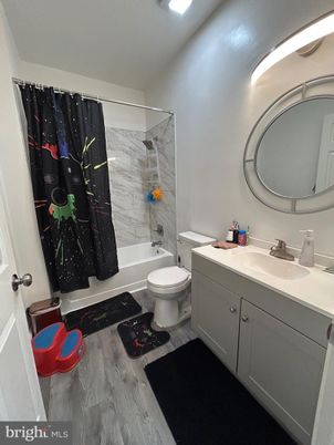 Bathroom, Interior, Marble Walls, Recessed Lighting, Wood Texture Flooring