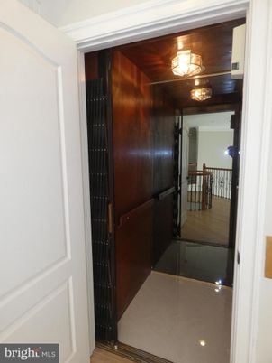 Elevator, Interior, Wood Texture Flooring, Wooden Walls