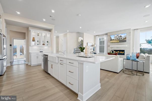 Fireplace, Interior, Kitchen, Living room, Recessed Lighting, Stainless Steel Appliances, Wood Texture Flooring
