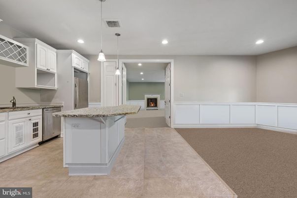 Fireplace, Interior, Kitchen, Pendant Lights, Recessed Lighting, Stainless Steel Appliances