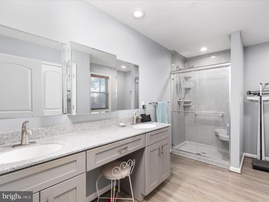 Bathroom, Dual Sink Vanities, Glass Shower, Interior, Recessed Lighting, Wood Texture Flooring