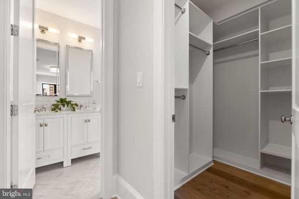 Bathroom, Dual Sink Vanities, Interior, Marble, Walk-in Closets, Wood Texture Flooring