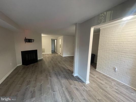 Empty room, Fireplace, Interior, Stone Walls, Wood Texture Flooring