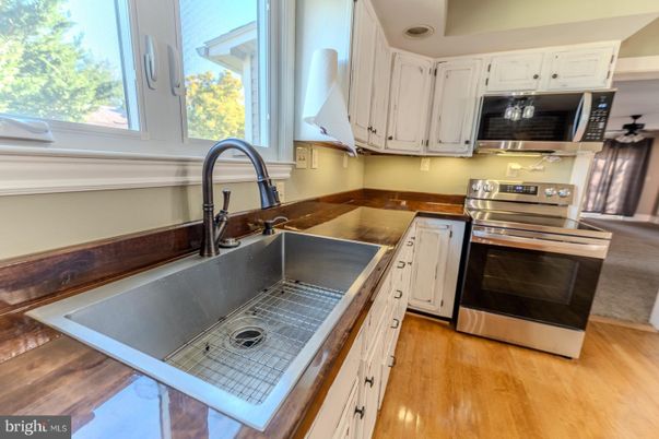 Interior, Kitchen, Tile Countertops, Wood Texture Flooring