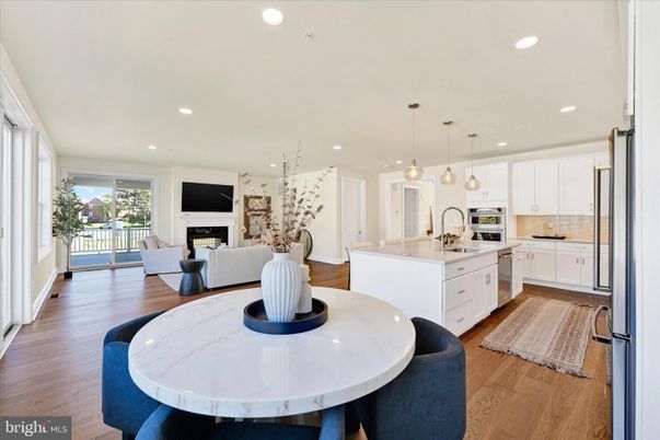 Fireplace, Interior, Kitchen, Living room, Pendant Lights, Recessed Lighting, Stainless Steel Appliances, Wood Texture Flooring