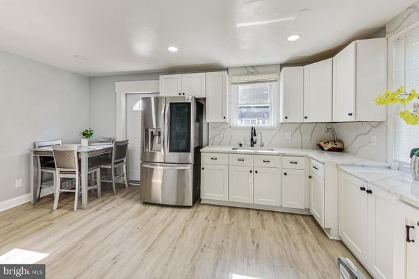 Dining room, Interior, Kitchen, Recessed Lighting, Stainless Steel Appliances, Wood Texture Flooring