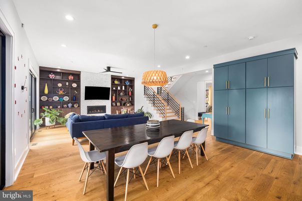 Dining room, Fireplace, Interior, Living room, Pendant Lights, Recessed Lighting, Wood Texture Flooring