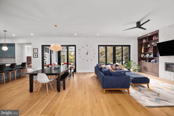 Dining room, Fireplace, Interior, Living room, Pendant Lights, Recessed Lighting, Wood Texture Flooring