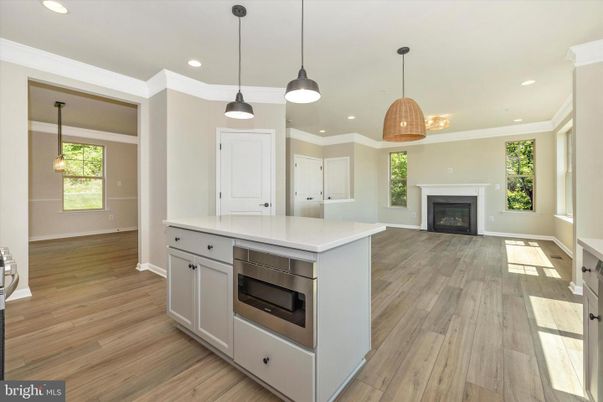 Fireplace, Interior, Kitchen, Pendant Lights, Recessed Lighting, Wood Texture Flooring