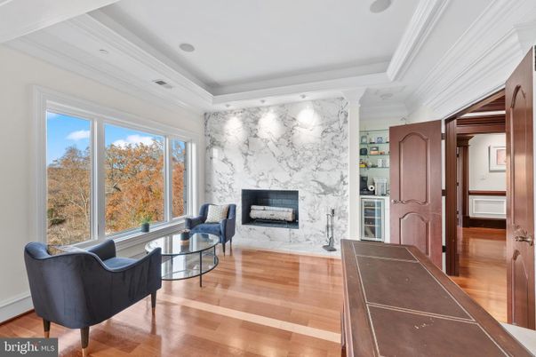 Fireplace, Interior, Marble Walls, Recessed Lighting, Wood Texture Flooring