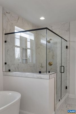 Bathroom, Free Standing Baths, Glass Shower, Interior, Marble, Marble Walls, Recessed Lighting